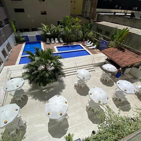 Apartamento Flat em Pitangueiras - sacada gourmet, 3 dorms, limpeza diária e serv de praia Guarujá Exterior foto